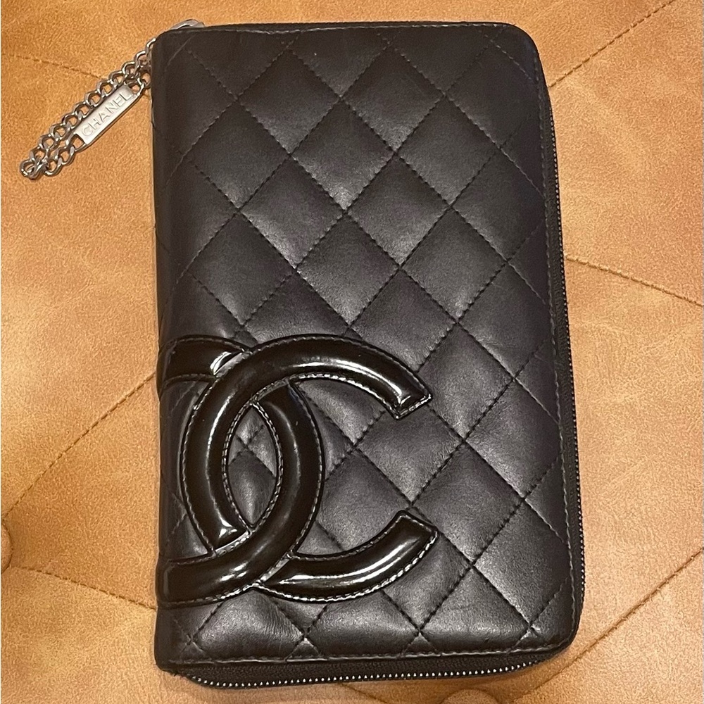CHANEL Black Quilted CC Zip-Around Wristlet Clutch